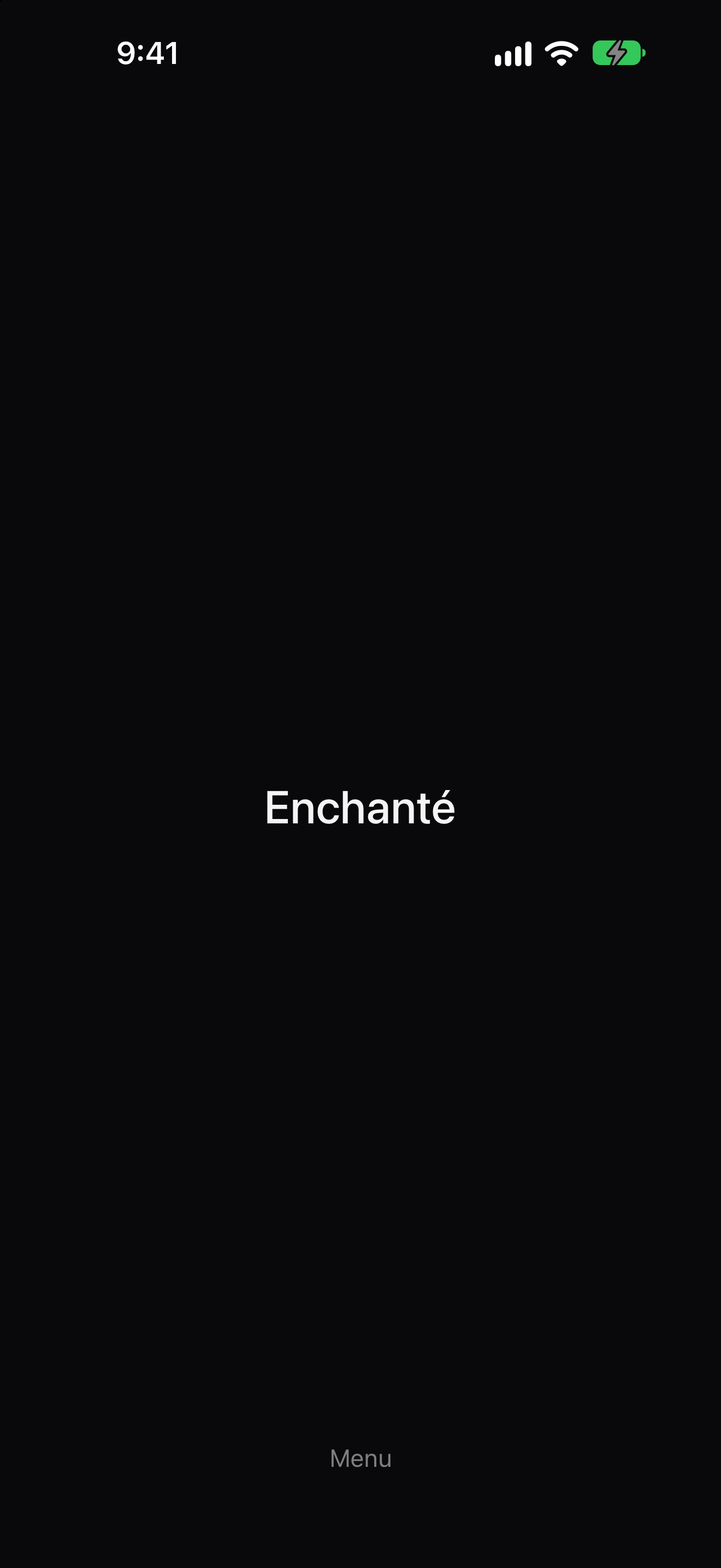 Madeleine vocabulary card displaying Enchanté in dark mode